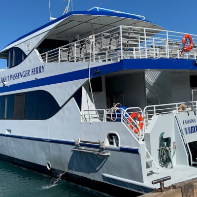 a boat is docked next to a body of water