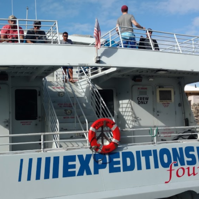 a boat sitting on top of a truck